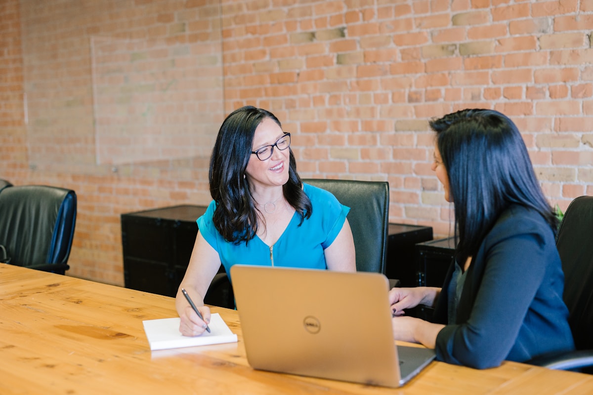 Client and procurement specialist reviewing a request